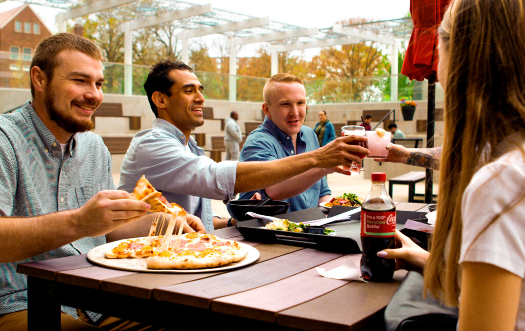Friends watching Chiefs game at Strang Hall in OP