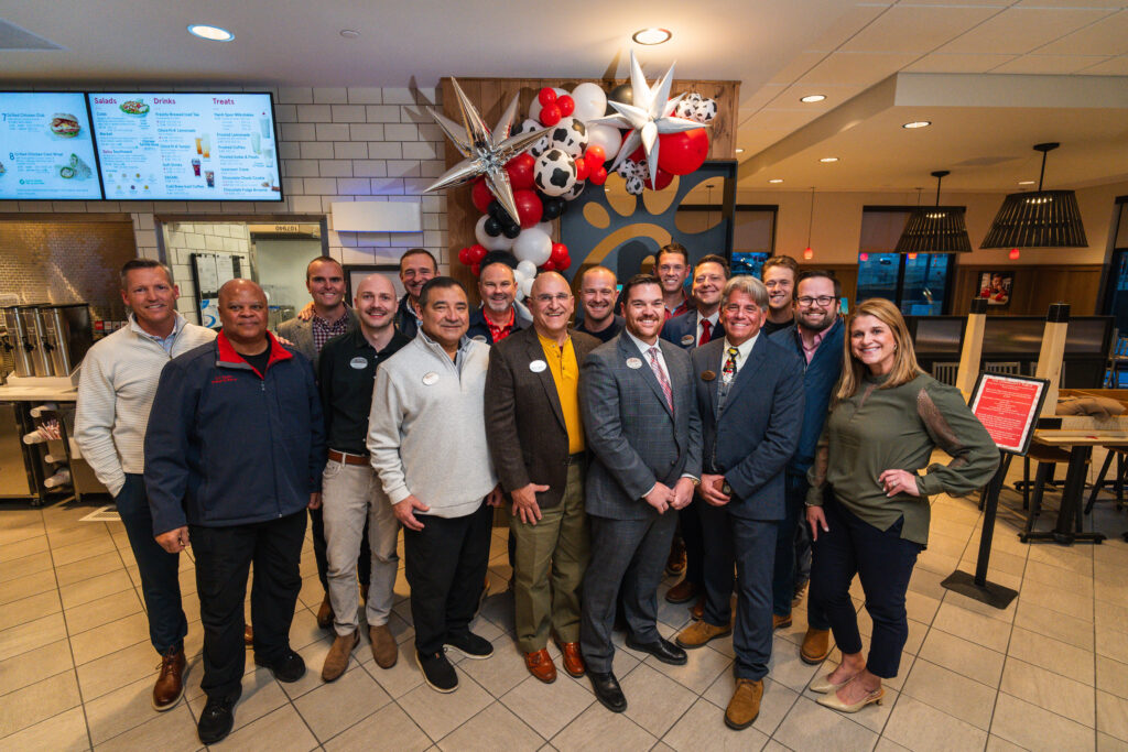 C.T. Taylor owner of Overland Park Chick-fil-A with other KC owners
