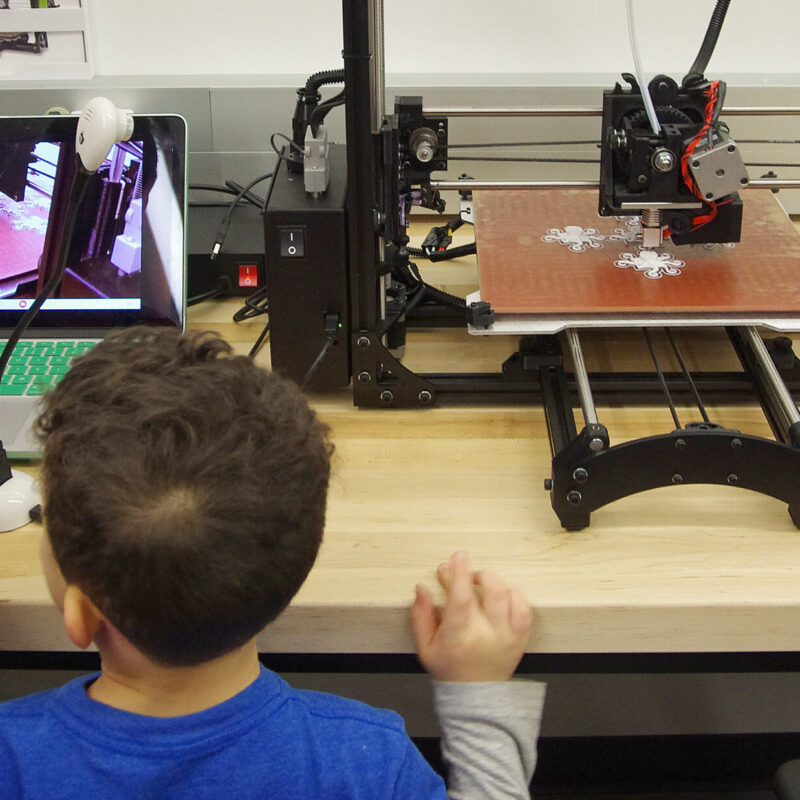 Child use the MakerSpace at Johnson County Library